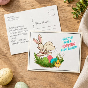 Bunter hüpfender Osterhase Postkarte