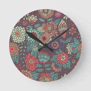 Buntes Blumenmuster im Cartoon-Stil Runde Wanduhr