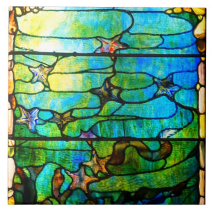 Buntglas-Tiffany-Fenster mit Sternfisch im Meer Fliese