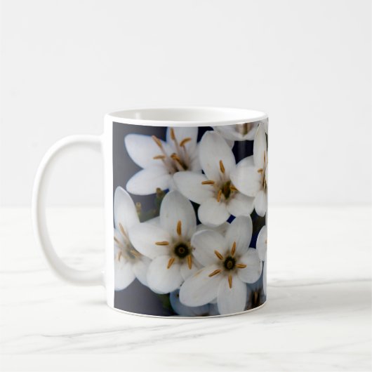 Buntöne aus weißen Blume Kaffeetasse (Links)