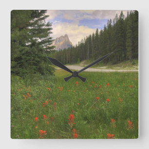 Burgen und Wildblumen Quadratische Wanduhr