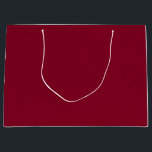 Burgund Große Geschenktüte<br><div class="desc">Burgund ist eine tiefe,  reiche Farbe,  die dunkles Rot mit Untertönen von Lila und manchmal Braun mischt. Sie wird oft als raffiniert,  luxuriös und warm beschrieben,  ähnlich der Farbe des Rotweins aus der französischen Region Burgund.</div>