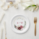 Burgundy Floral & Gold Wreath Monogram Wedding Pappteller<br><div class="desc">Serve your wedding cake or appetizers in style with these elegant paper plates. The design features a luxurious gold circular frame decorated with a lush arrangement of deep burgundy and soft blush peonies. Personalized with the couple's initials and wedding date in a vintage-style font, these plates add a high-end, botanical...</div>