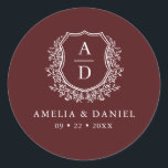Burgundy White Wappen Moderne Monogram Wedding Runder Aufkleber<br><div class="desc">Fügen Sie Ihrer Hochzeit eine Touch von Eleganz und Wärme mit dem Burgundy White Wappen Modern Monogram Wedding Classic Round Sticker hinzu. Mit einem bordeauxfarbenen Hintergrund, einem raffinierten, weißen Wappen und einem personalisierten Monogramm ist dieser Aufkleber perfekt, um Ihre Hochzeitsfeier, Ihre Favoriten oder Ihre Dekoration zu verbessern. Der klassische und...</div>