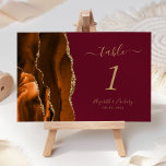 Burnt Orange Gold Agate Burgundy Wedding Tischnummer<br><div class="desc">Diese elegante moderne Hochzeitskarte besticht durch eine gelbe,  orangefarbene Tischnummer mit einem vergoldeten Imitat-Glitzer. Der anpassbare Text kombiniert goldfarbene Handschriften mit kursiven und kopperplate-Schriftart auf bordeauxfarbenem Hintergrund. Eine ideale Farbkombination für eine Hochzeit im Herbst.</div>