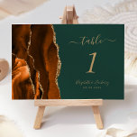 Burnt Orange Gold Agate Dark Green Wedding Tischnummer<br><div class="desc">Der links Rand dieser eleganten,  modernen Hochzeitskarte mit einer farbenfrohen,  orangefarbenen Tischnummer,  die mit einem vergoldeten Imitat-Glitzer bestickt ist. Der anpassbare Text kombiniert goldfarbene Handschriften mit kursiven und kopperplate-Schriftart auf dunkelgrünem Hintergrund.</div>