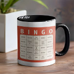 Business Buzzwords Bingo Tasse<br><div class="desc">Business Buzzword Bingo Office Tasse - Suche nach Ideen für Bürogeschenke? Sehen Sie nicht weiter... wir haben Sie völlig überdeckt got. Kein langweiliges Treffen wird mit diesen unglaublich witzig Büro Humor-Tasse jemals dasselbe sein! Die vorgestellte Illustration ist eine Bingo-Spielkarte mit Schlagworten, die wir jeden Tag während langweiliger Geschäftstreffen wie Feedback...</div>