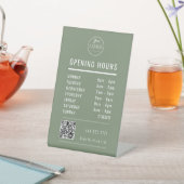 Business Opening Hours on Muted Green Logo QR Code Sockelschild (In SItu)