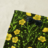 Buttercups auf schwarz strandtuch (Beispiel)