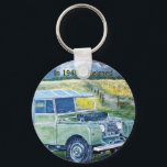 Button Key Ring With Land Rover Print Schlüsselanhänger<br><div class="desc">"FREYA" The Series1 Truck Cab Key Ring with Wording : In 1948 It Reigned. From a painting by GJLC JackCrisp.co.uk Also available on other Key Ring Styles.</div>