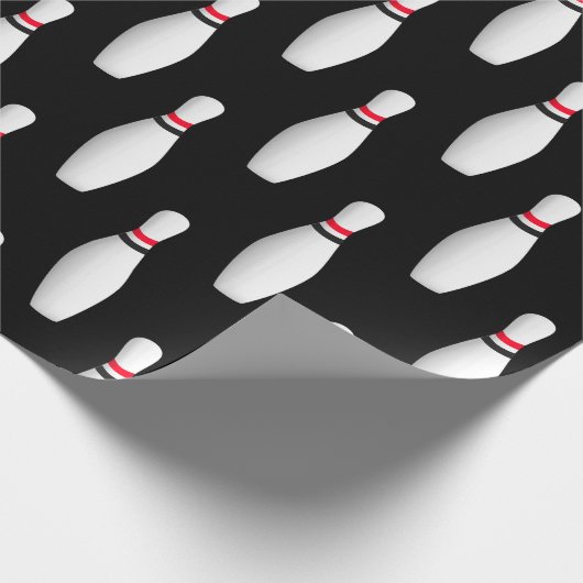 Buttone aus weißem Bowling in Schwarz Geschenkpapier (Ecke)