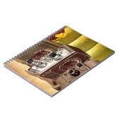 ca. 1950 Zuhause-Filmkameras und Notizblock (Linke Seite)