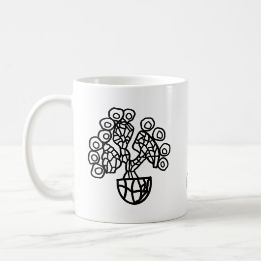 CACTUS IN EINER KÜCHE KAFFEETASSE (Links)