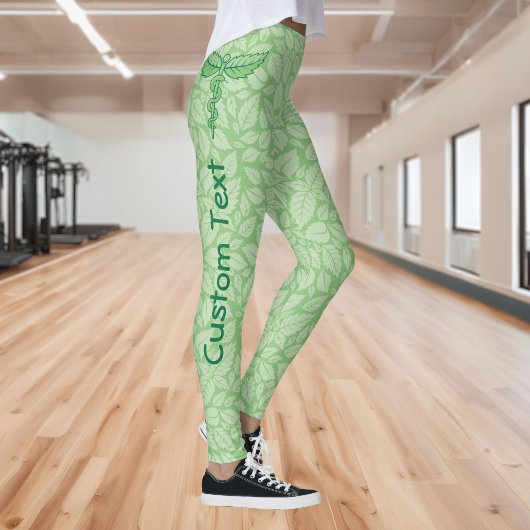 Caduceus mit Blätter Hintergrund Leggings