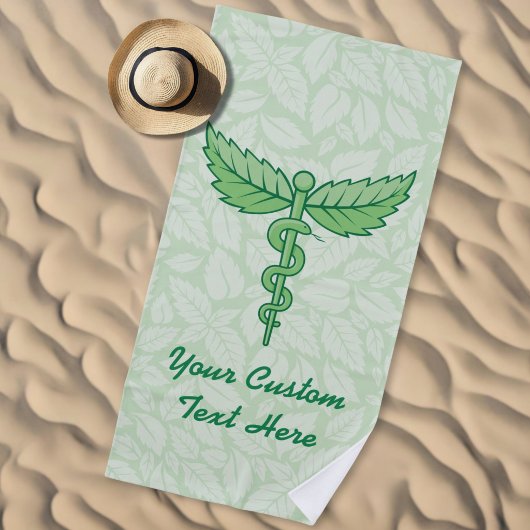Caduceus mit Blätter Hintergrund Strandtuch