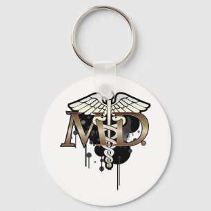 Caduceus-Schmutz mit M.D. Schlüsselanhänger