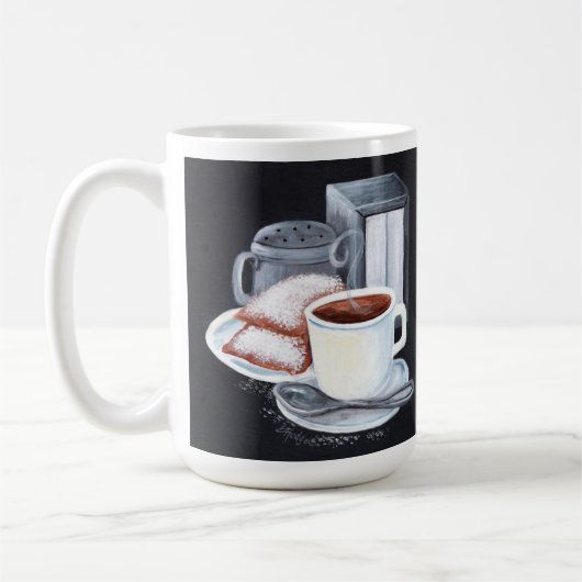 Cafe du Monde auf Schwarz-weißer Tasse (Links)