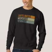 Caffeinated Medicated Hydrated Saying Nurse Sweatshirt (Vorderseite)