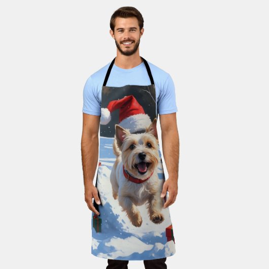 Cairn Terrier läuft in Snow mit Weihnachtsmütze Schürze (Getragen)