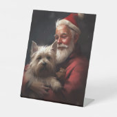 Cairn Terrier mit dem Weihnachtsmann Sockelschild