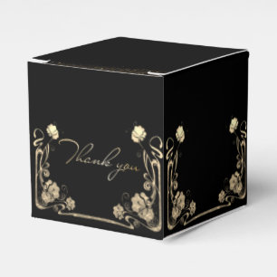 Caja de regalo negra con flores doradas geschenkschachtel