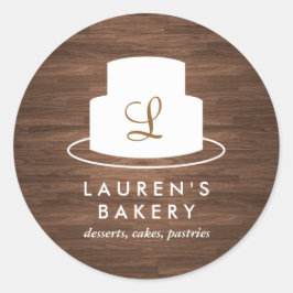 Cake Monogram Logo in Weiß auf Braunholz Runder Aufkleber
