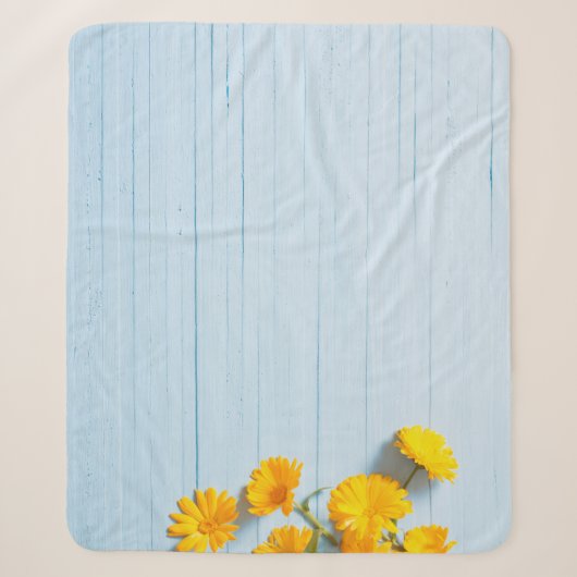 Calendula-Blume: blauer Holzhintergrund Sherpadecke (Vorderseite)