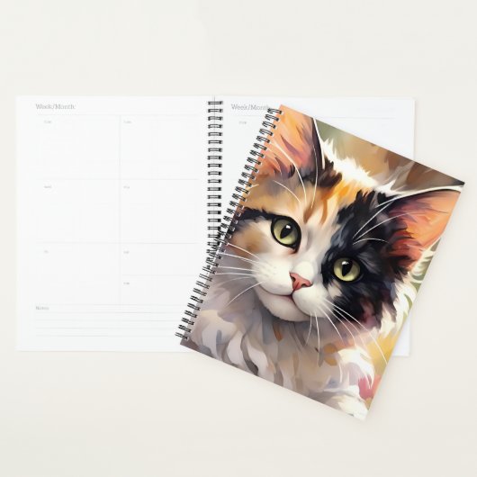 Calico Katze und Schmetterlinge im Frühlingspark Planer (Anzeige)