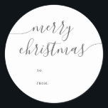 Calligrafie Minimalistisch Merry Christmas Gift Runder Aufkleber<br><div class="desc">Fügen Sie Ihren Urlaubsgeschenken eine charmante und persönliche Touch mit diesem reizvollen Weihnachtsaufkleber hinzu. Die Überschrift "Frohe Weihnachten" ist elegant in Kalligraphie gestaltet und verleiht Ihren Geschenken ein spielerisches, aber raffiniertes Gefühl. Unter den Begrüßungsfeldern "To" und "From" können Sie Ihre Geschenke mühelos mit einer persönlichen Note versehen. Dieser Aufkleber ist...</div>