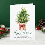Calligraphy Ink Watercolor Pine Tree Red Bow Fold Feiertagskarte<br><div class="desc">Modern Elegant Calligraphy Ink Script Happy Holidays Folded Card includes a Watercolor Pine Tree in a paper bag with a Red Ribbon Bow,  Gold and Red Christmas Ornaments.</div>