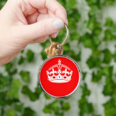 CALM CROWN behalten auf roter Dekoration Schlüsselanhänger (Hand)