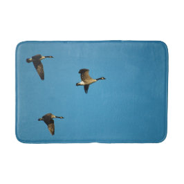 Canadian geese in flight badematte