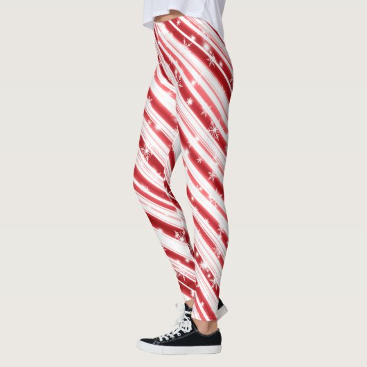 Candy Canon mit Sternen und Schneeflocken Leggings (Links)