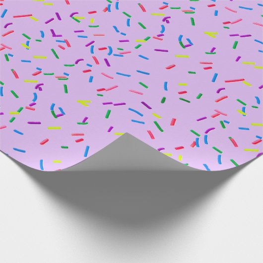 Candy Sprinkles auf Lila Geschenkpapier (Ecke)
