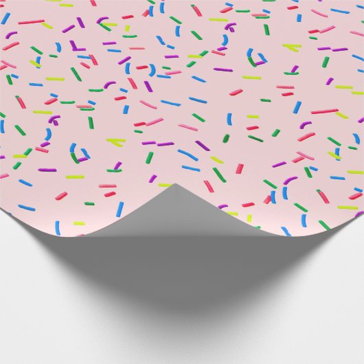 Candy Sprinkles auf rosa Geschenkpapier (Ecke)