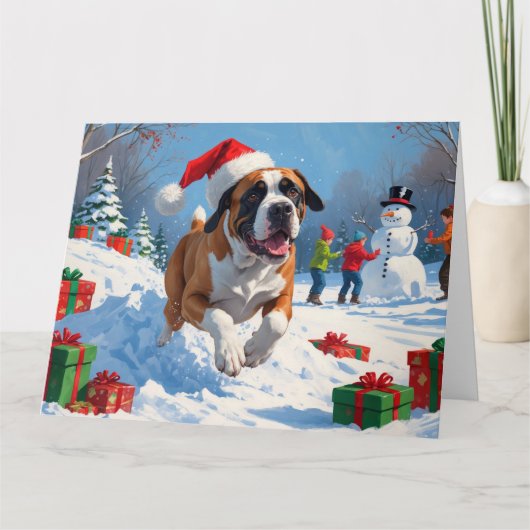 Cane Corso läuft im Schnee mit Weihnachtshut Karte (Vorderseite)