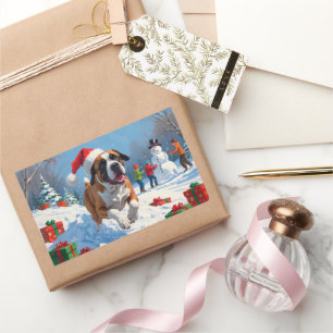 Cane Corso läuft im Schnee mit Weihnachtsmütze Rechteckiger Aufkleber