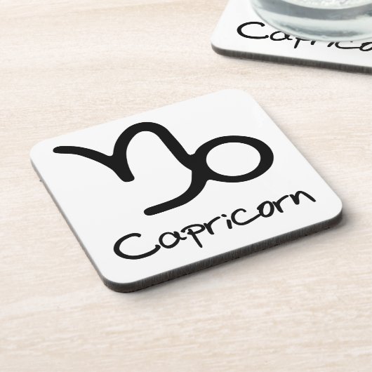 Capricorn Zodiac Zeichen auf weißem Hintergrund Getränkeuntersetzer (Linke Seite)