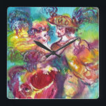 CARNIVAL TANCE Venezianischer Maskenball Quadratische Wanduhr<br><div class="desc">Farbenfrohe, elegante und lebendige Kunsteinladung.Romantische Karnevaltänzer: Künstlerische, skurrile, expressive Tanzfiguren, schöne blonde Frau in feathered funkelnden Kostümen tanzt mit einem jungen Harlequin .Aquarellmalerei in hellrosa, fuchsianisch, grün, rot, blau, gelb, goldene Glitzern, inspiriert von Comedy of Art (Commedia dell'arte) und dem Karneval von Venedig. Es ist auch ein wunderschönes Geschenk für...</div>