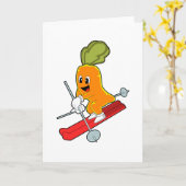 Carrot als Skifahrer mit Ski Karte (Gelbe Blume)