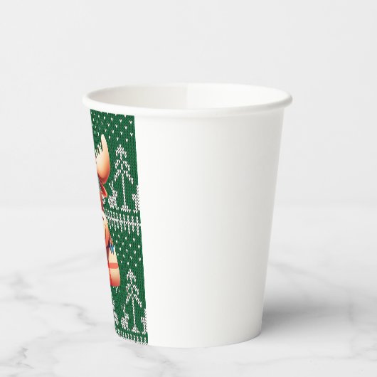 Cartoon auf grünem Steppmuster Pappbecher (Links)