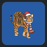 Cartoon Christmas Tiger Sticker<br><div class="desc">Ein zeichn einer Cartoon-Tigerkatze mit einem Schal und einem Weihnachtshut auf dem Kopf.</div>