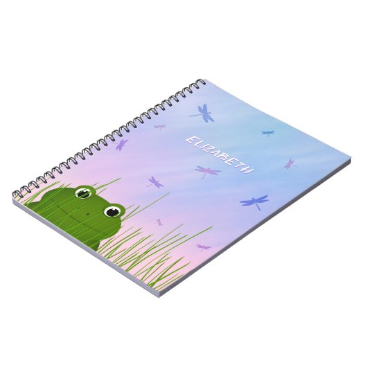 Cartoon Frosch pinkeln durch Grasdrachenfliegen Notizblock (Linke Seite)