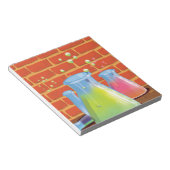 Cartoon Glass Science Ausrüstung auf einer Bank Notizblock (angewinkelt)