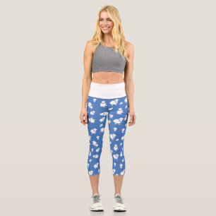 Cartoon Schafe auf blauem Hintergrund Capri Leggings