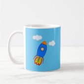 Cartoon Space Rocket in Blue Sky Kaffeetasse (Links)
