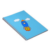Cartoon Space Rocket in Blue Sky Notizblock (Rechte Seite)