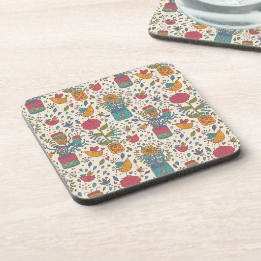 Cartoonblumenmuster mit Vögeln 2 Getränkeuntersetzer (Linke Seite)