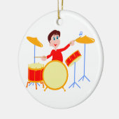 Cartoonjunge, der drumset gezackte Ränder spielt Keramikornament (Links)