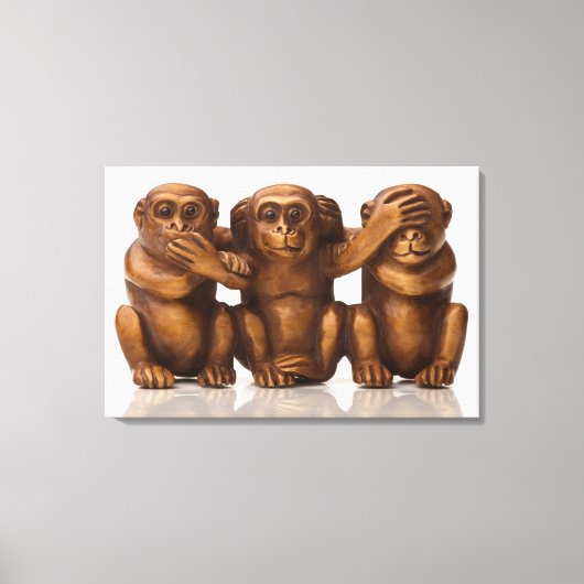 Carving of three wooden monkeys leinwanddruck (Vorderseite)